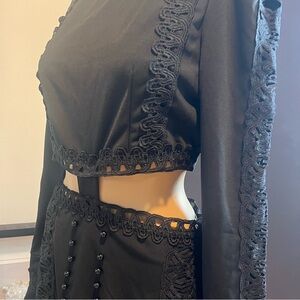 Beautiful black dress one piece but looks like two piece.